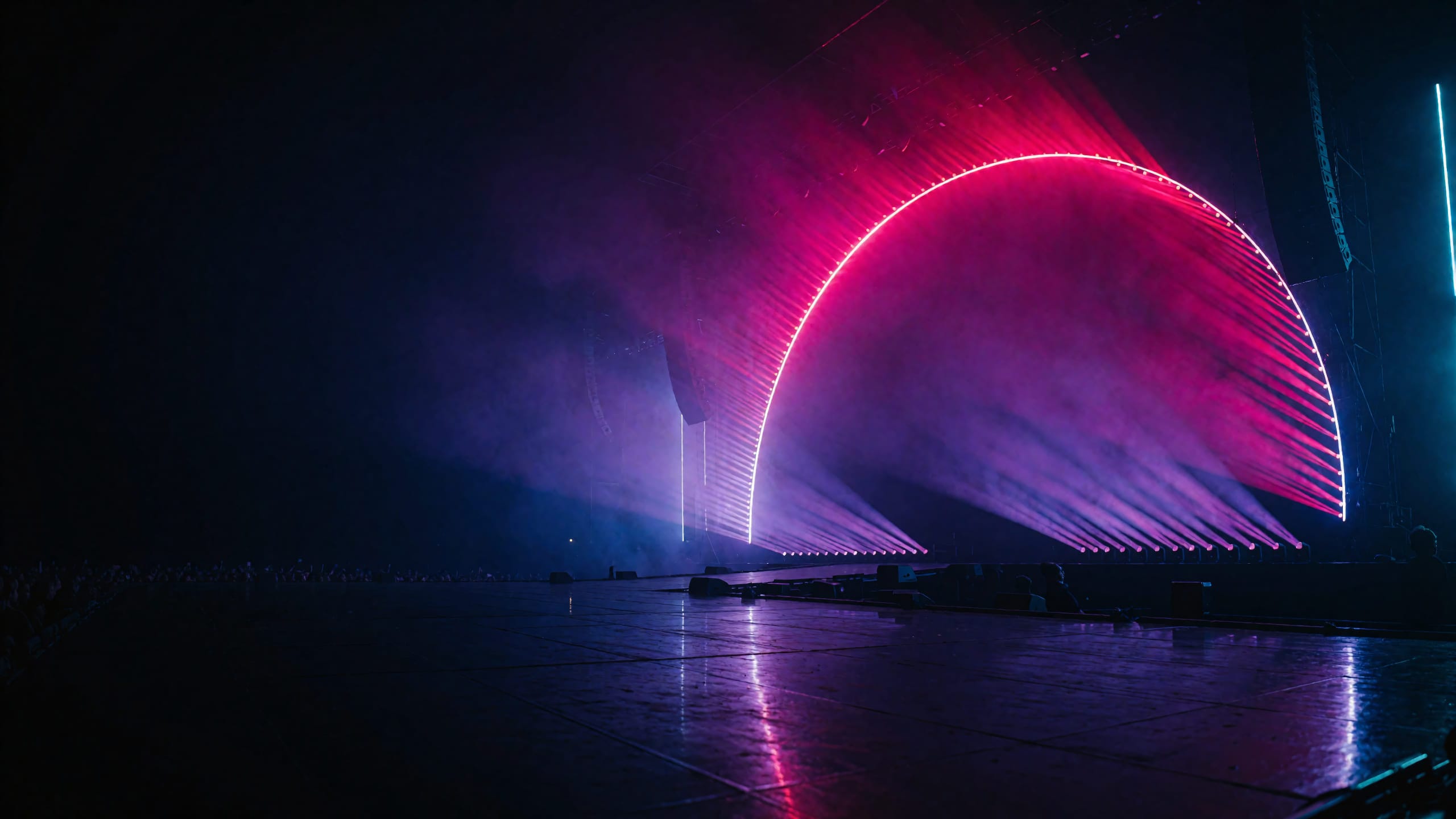 Neon stage with magenta and violet light beams and an arch glow